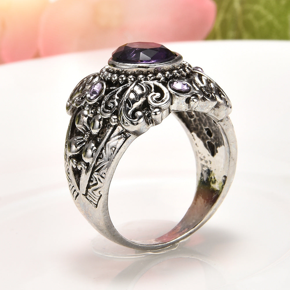 Carved amethyst ring