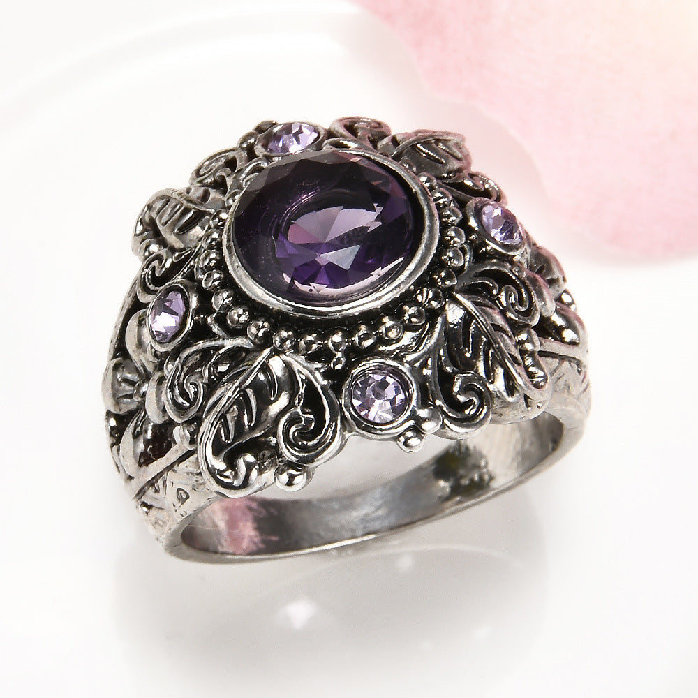 Carved amethyst ring